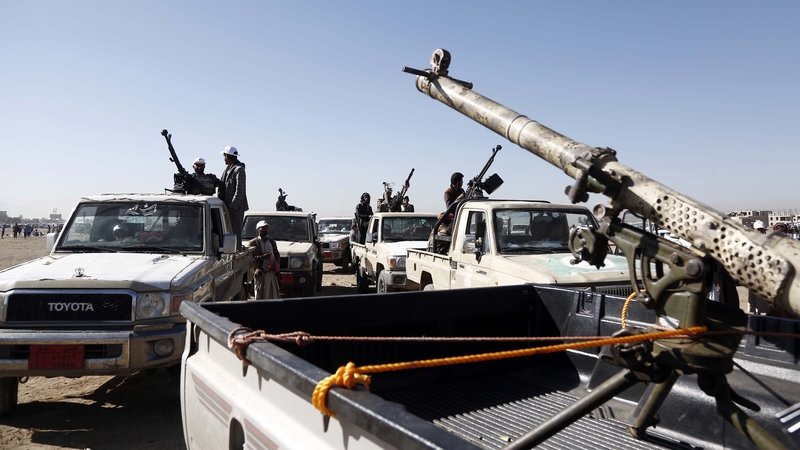 Armed members of Tuk Sanaa tribe march within a demonstration against the attacks of United States and United Kingdom in Sanaa, Yemen