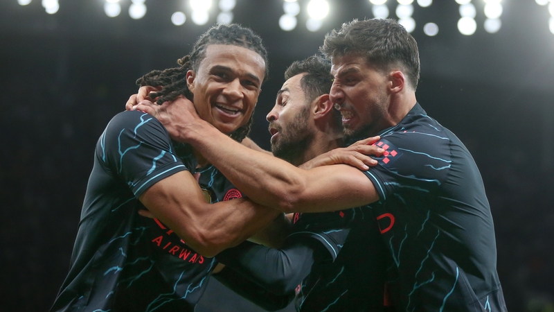 Nathan Ake celebrates his late goal with Manchester City team-mates
