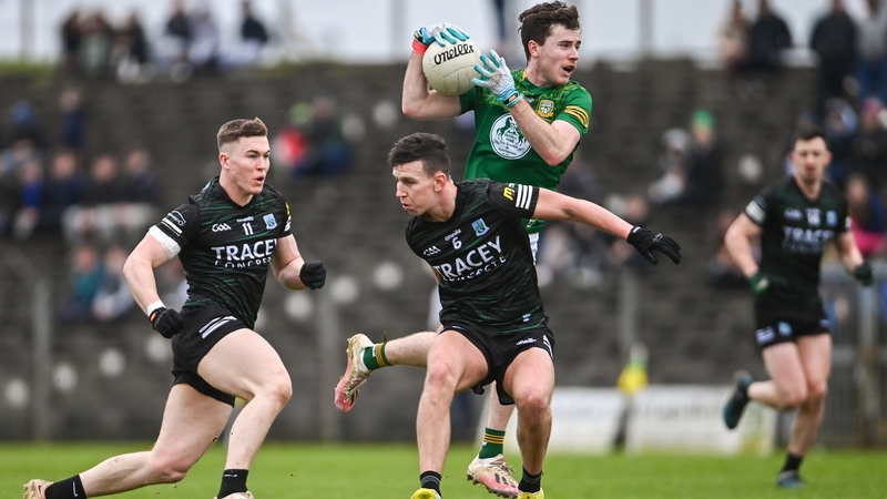 Meath's Jack O'Connor evades the tackle of Fermanagh's Ronan McCaffrey