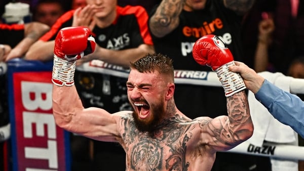 Lewis Crocker celebrates defeating Jose Felix during their WBO Inter-Continental welterweight bout at Ulster Hall