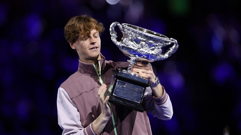 Jannik Sinner gets his hands on the Norman Brookes Challenge Cup after defeating Daniil Medvedev