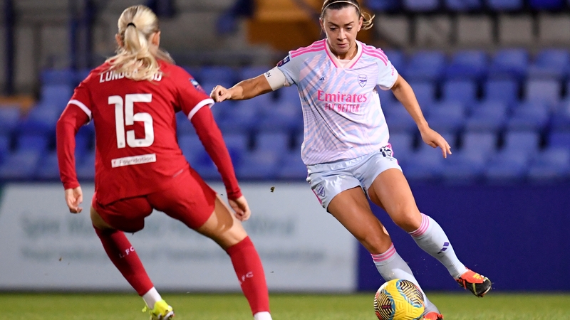 Katie McCabe takes on Liverpool's Sofie Lundgaard