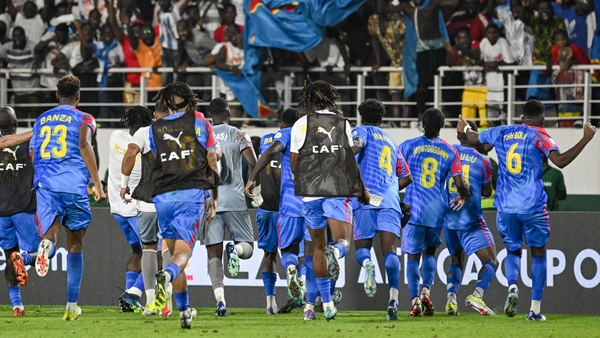 DR Congo players celebrate their shootout victory over Egypt