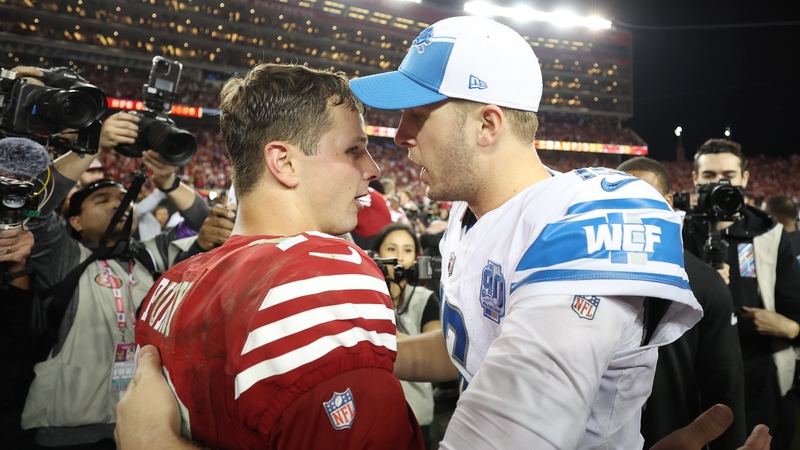 Brock Purdy congratulated by Jared Goff