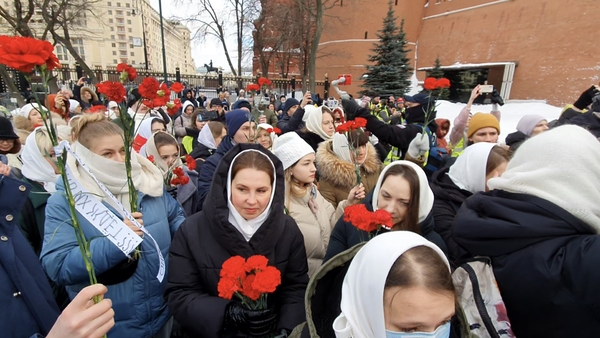 Wives of Russian soldiers in Moscow's Red Square today laid flowers as part of their 'Way Home' campaign