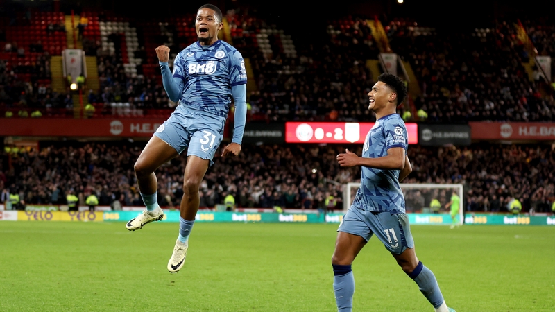Leon Bailey celebrates scoring his team's third goal