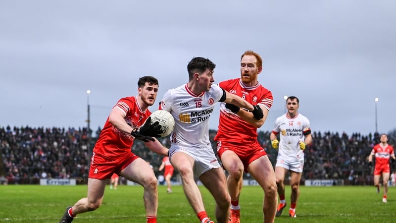 Ciarán Daly of Tyrone has Padraig McGrogan and Conor Glass for company during the Celtic Park clash