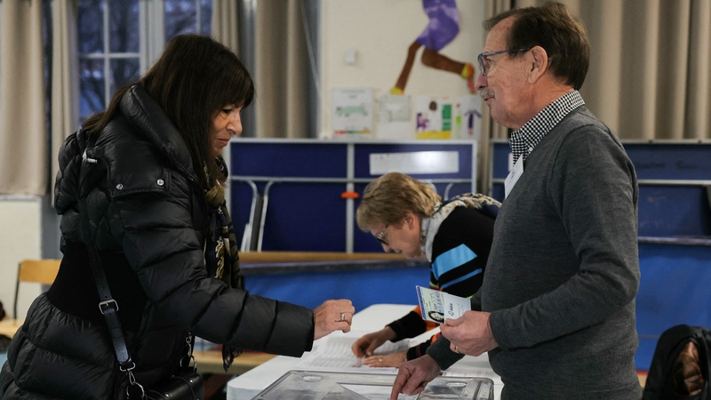 Paris mayor Anne Hidalgo casts her ballot at a polling station as Paris votes on the creation of special parking fees for the heaviest and most polluting cars and SUVs