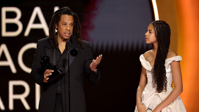 US rapper Jay-Z on stage at the Grammys with his and Beyoncé's daughter Blue Ivy