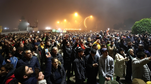 Earthquake survivors gather at the Vali Urgen Park for the silent march for people who lost their lives