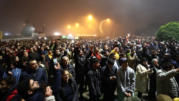 Earthquake survivors gather at the Vali Urgen Park for the silent march for people who lost their lives