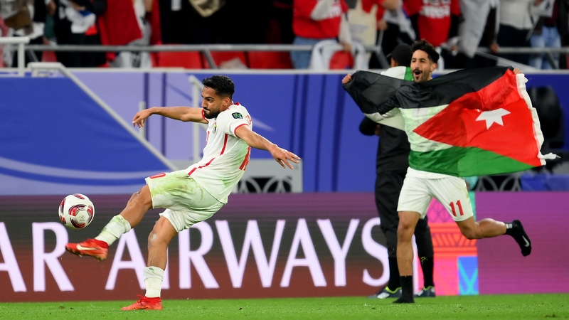 Jordanian goalscorers Musa Al-Taamari and Yazan Al-Naimat celebrate after the game