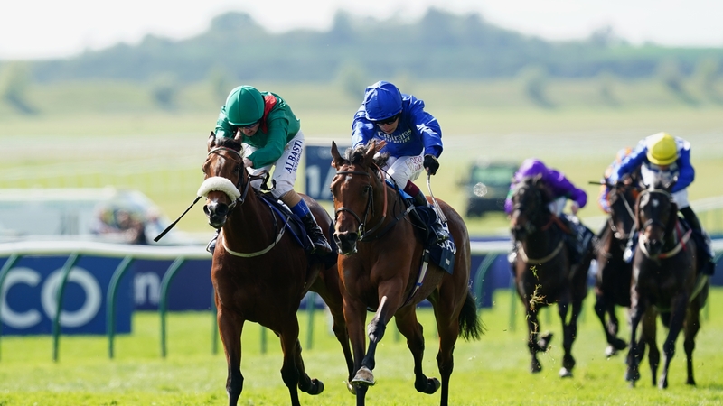 Mawj and Oisin Murphy (right) coming home to win the Newmarket Classic