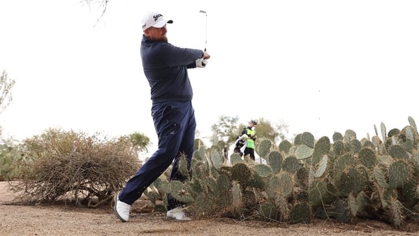 Shane Lowry plays his second shot at the second hole at TPC Scottsdale