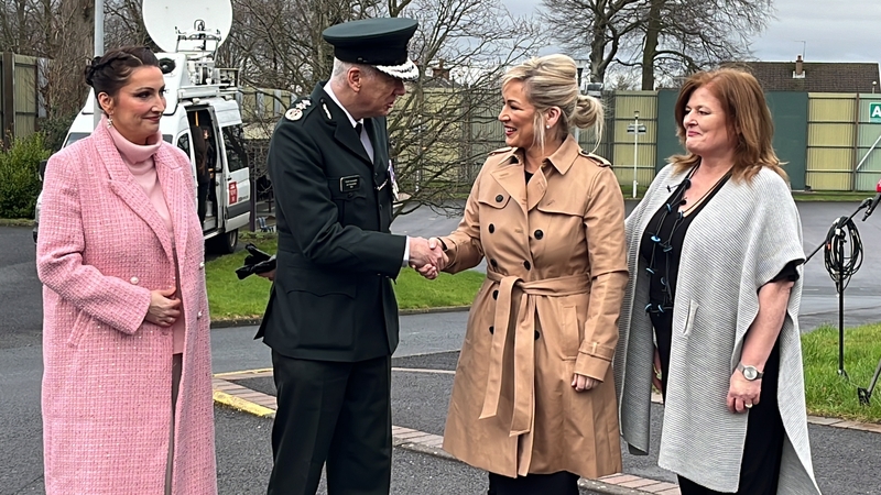 Michelle O'Neill was accompanied by Emma Little-Pengelly (L) and Policing Board chair Deirdre Toner