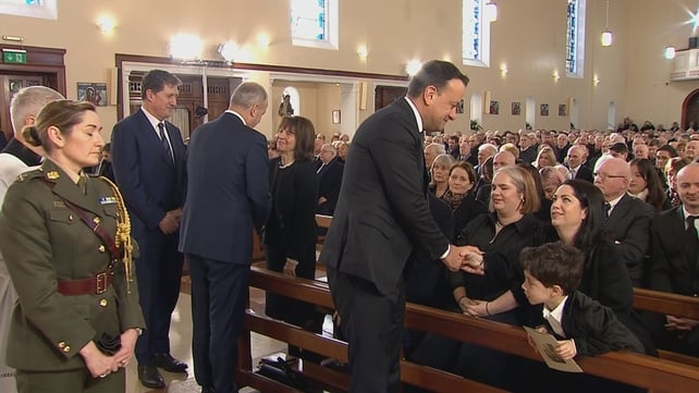 Taoiseach Leo Varadkar, Tánaiste Micheál Martin and Green Party leader Eamon Ryan pay their respects John Bruton's family