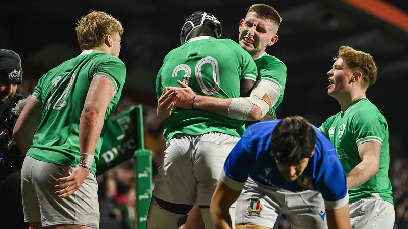 Sean Edogbo embraced by Ben O'Connor after scoring Ireland's third try