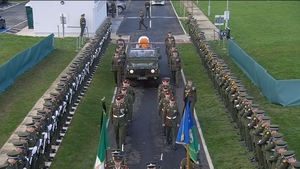 A view of the coffin on its way into Rosske cemetery ahead of the burial