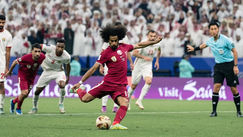 Akram Afif scores from the penalty spot
