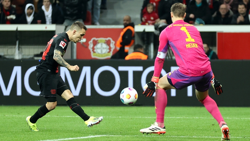 Alex Grimaldo of Bayer Leverkusen scores his team's second