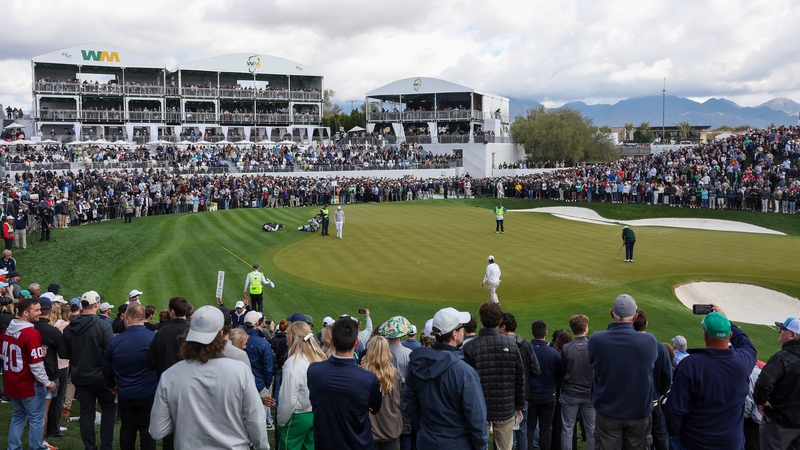 Shane Lowry putts on the 18th green during the continuation of the second round of the WM Phoenix Open