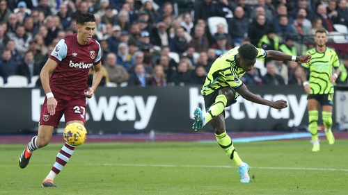 Bukayo Saka scores his side's fifth goal