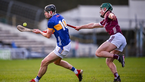Gearoid O'Connor of Tipperary is tackled by Galway's Gavin Lee