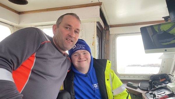 Seán Boyle (R) pictured with Séamus Boyle in the pilot house of the ferry