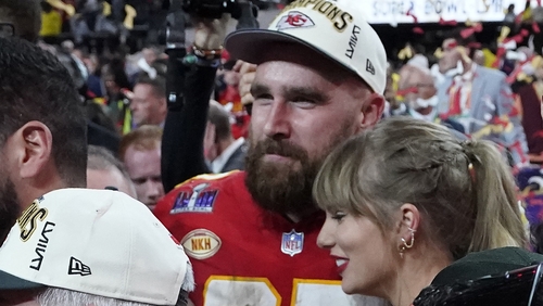 Kansas City Chiefs' tight end Travis Kelce and Taylor Swift embrace as they celebrate the Chiefs winning Super Bowl LVIII against the San Francisco 49ers at Allegiant Stadium in Las Vegas, Nevada, February 11, 2024. (Photo by TIMOTHY A. CLARY/AFP)