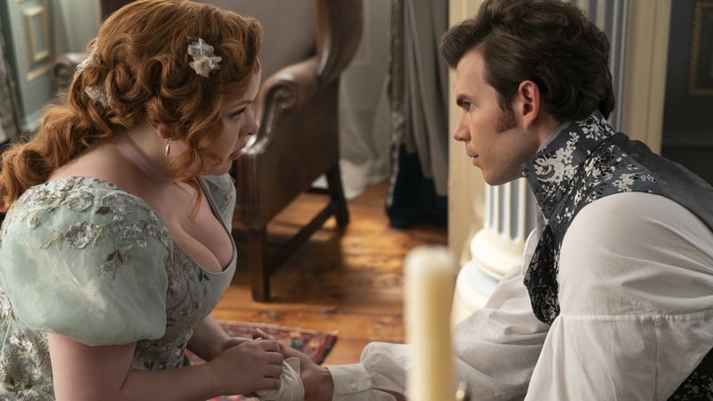 Nicola Coughlan as Penelope Featherington and Luke Newton as Colin Bridgerton