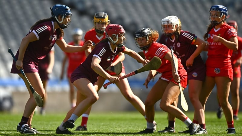 Galway's Ciara Hickey tries to come through a crowd of Cork players during last year's Division 1A final