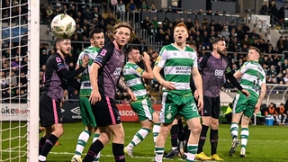 Sean Hoare, right, of Shamrock Rovers watches his header go wide against Dundalk