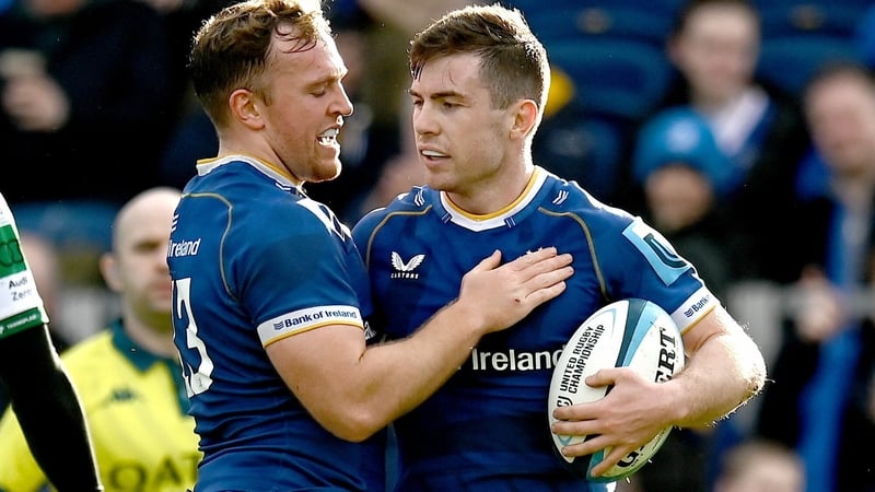 Luke McGrath (right) scored one of Leinster's seven tries