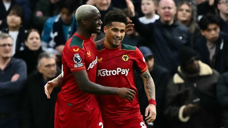 Joao Gomes (R) celebrates after scoring Wolves' second goal