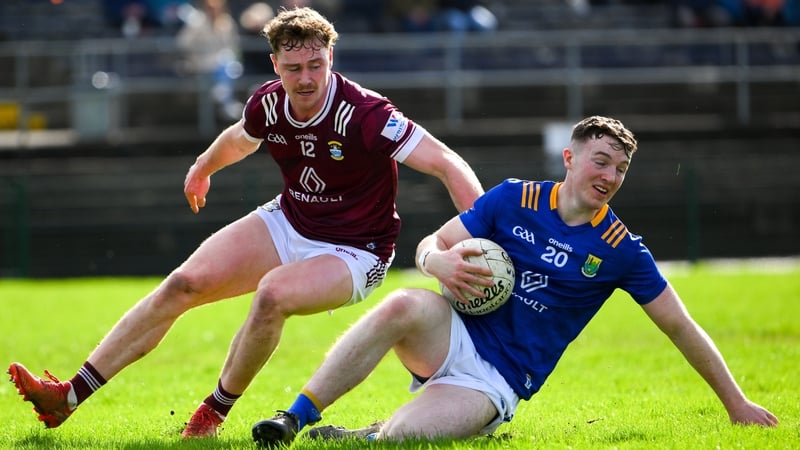 Wicklow's Liam O'Neill (R) is harried Jonathan Lynam of Westmeath