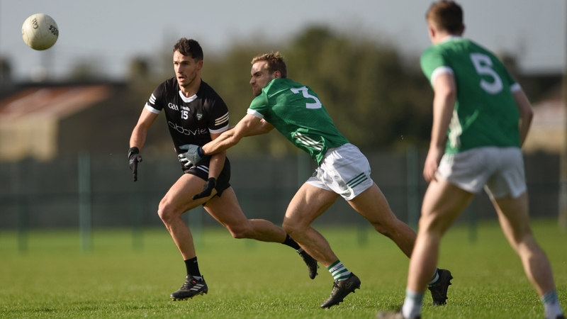 Niall Murphy in action against Sean O'Dea