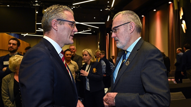 Jarlath Burns (L) will succeed Larry McCarthy this weekend