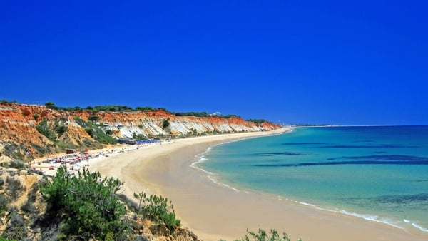 If you're dreaming of escaping the dreary weather for a long stretch of sand, here's some inspiration.