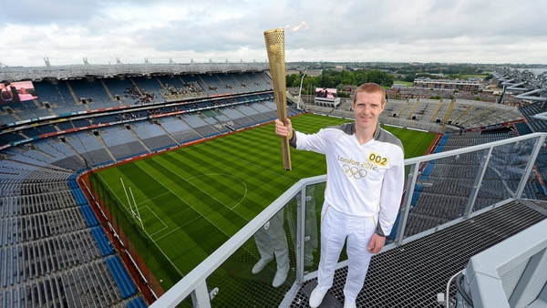 The Olympic torch touring Croke Park in Henry Shefflin's hands in 2012