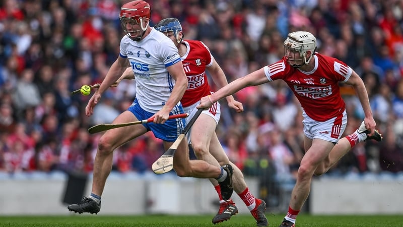 Calum Lyons of Waterford is pursued by Cork's Conor Lehane and Shane Barrett during last year's Munster Championship