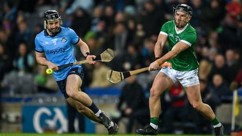 Limerick's Darragh O'Donoan under pressure from Seán Gallagher