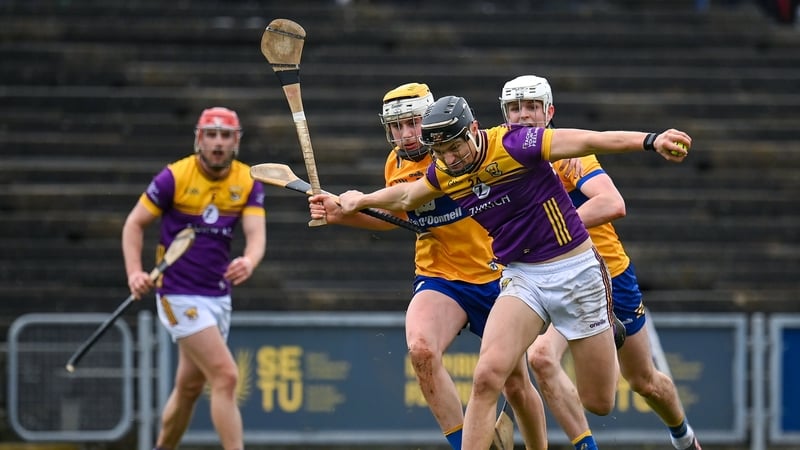 Wexford's Jack O'Connor Wexford in action against Clare duo Seán Rynne, left, and Cian Galvin