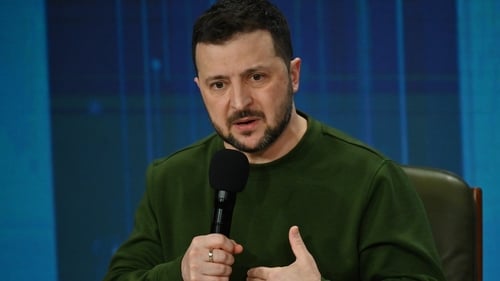 Ukrainian President Volodymyr Zelensky speaking at a press conference in Kyiv today