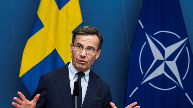 Swedish Prime Minister Ulf Kristersson addressing a joint press conference with the NATO Secretary General last year