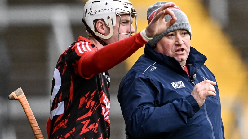 Cork manager Pat Ryan (R) speaks with Luke Meade during their Allianz Hurling League Division 1 win over Waterford