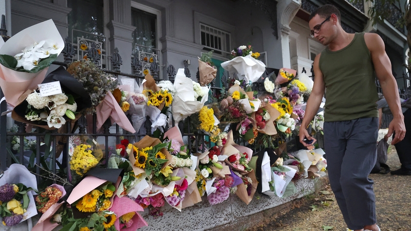 Floral tributes outside the shared home of entertainment journalist Jesse Baird in the Sydney suburb of Paddington