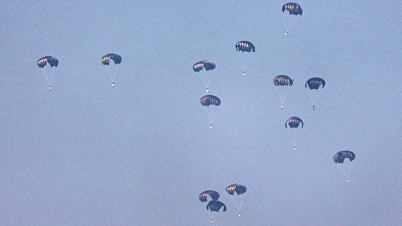 A Jordanian military aircraft (not pictured) drops humanitarian aid over Rafah and Khan Yunis last month