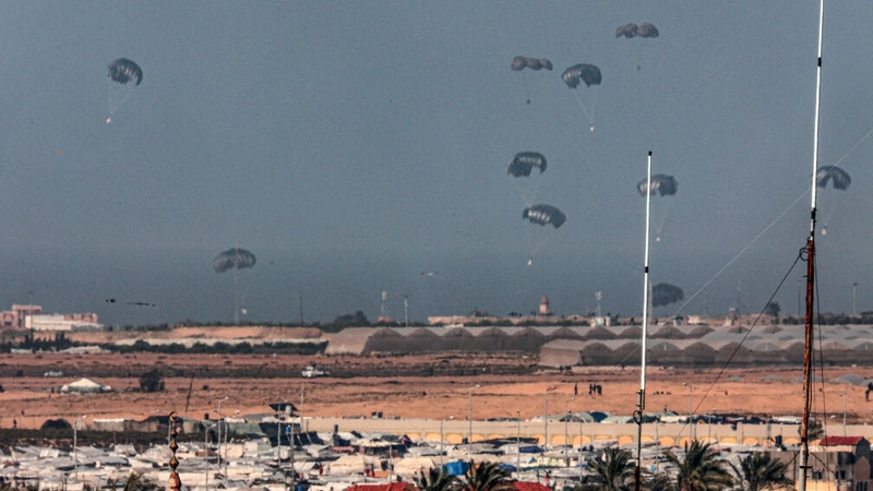 Seven C-130 military transport aircraft air dropped food parcels along the Gaza coast