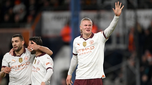 Erling Haaland signals his goal tally to the away fans at Kenilworth Road