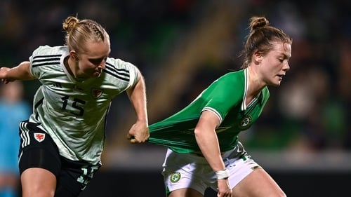 Emily Murphy (R) in action against Elise Hughes of Wales